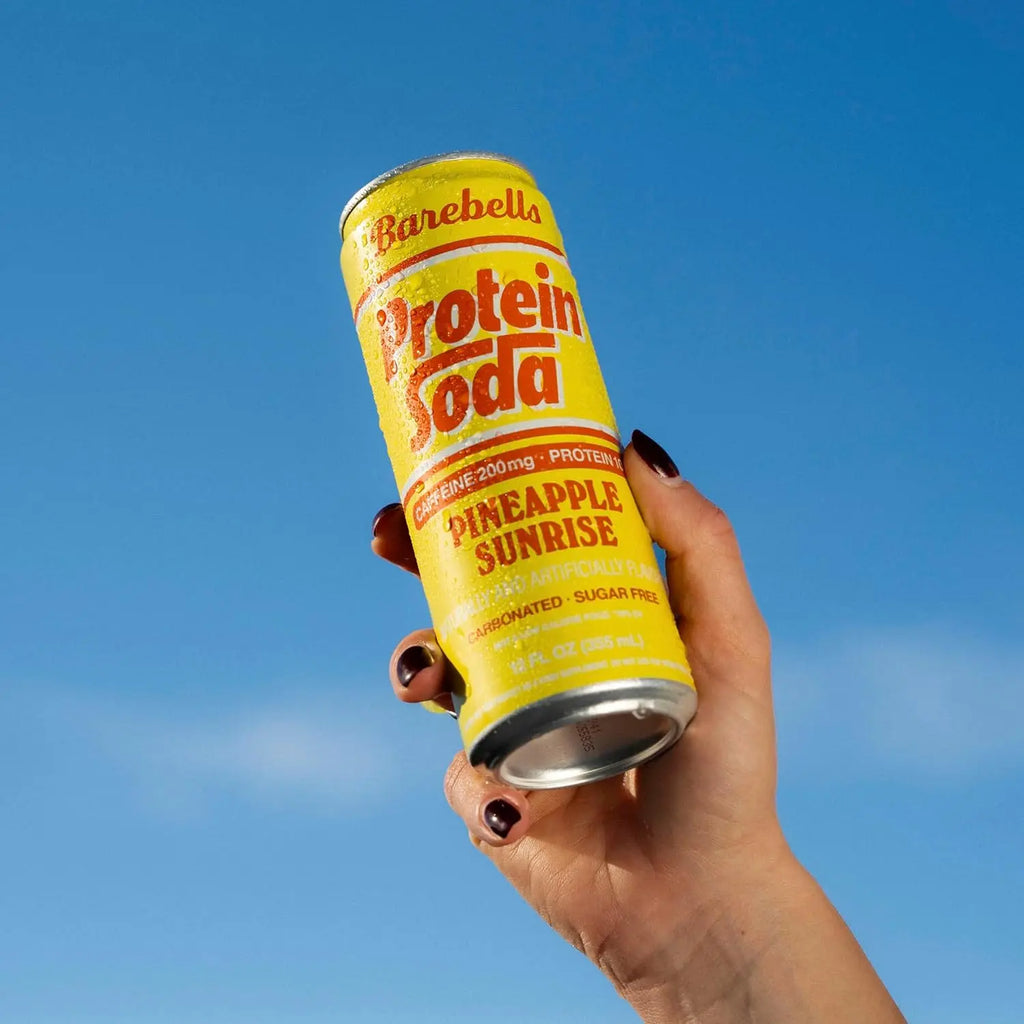 Barebells Protein Soda | Bebida Proteica con Cafeína 200 mg | 12 Latas de 355 ml | Sabor Pineapple Sunrise